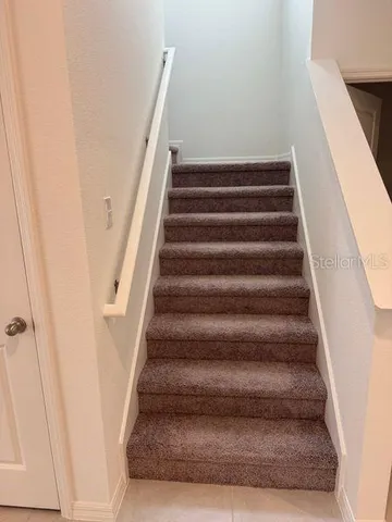 a view of a yard in front of a house