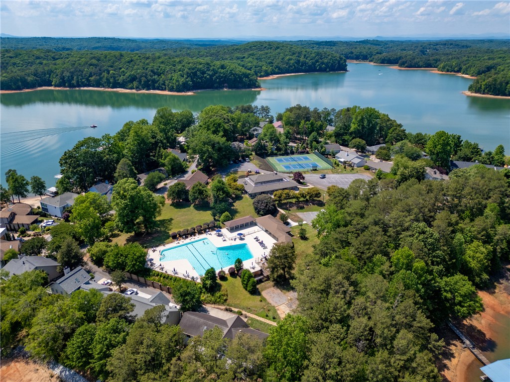 502 Point Road Westminster, SC 29693 - Photo 6 of 49 Lakeside community with a vibrant pool and tennis courts for recreation.