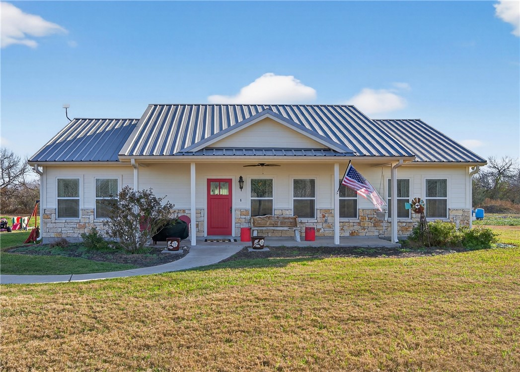 20401 County Road 1740 Mathis, TX 78368 - Photo 2 of 35 a front view of a house with a porch