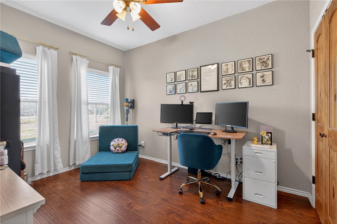 20401 County Road 1740 Mathis, TX 78368 - Photo 24 of 35 a workspace with wooden floor and a window
