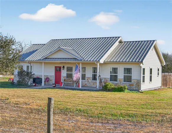 a front view of a house having patio