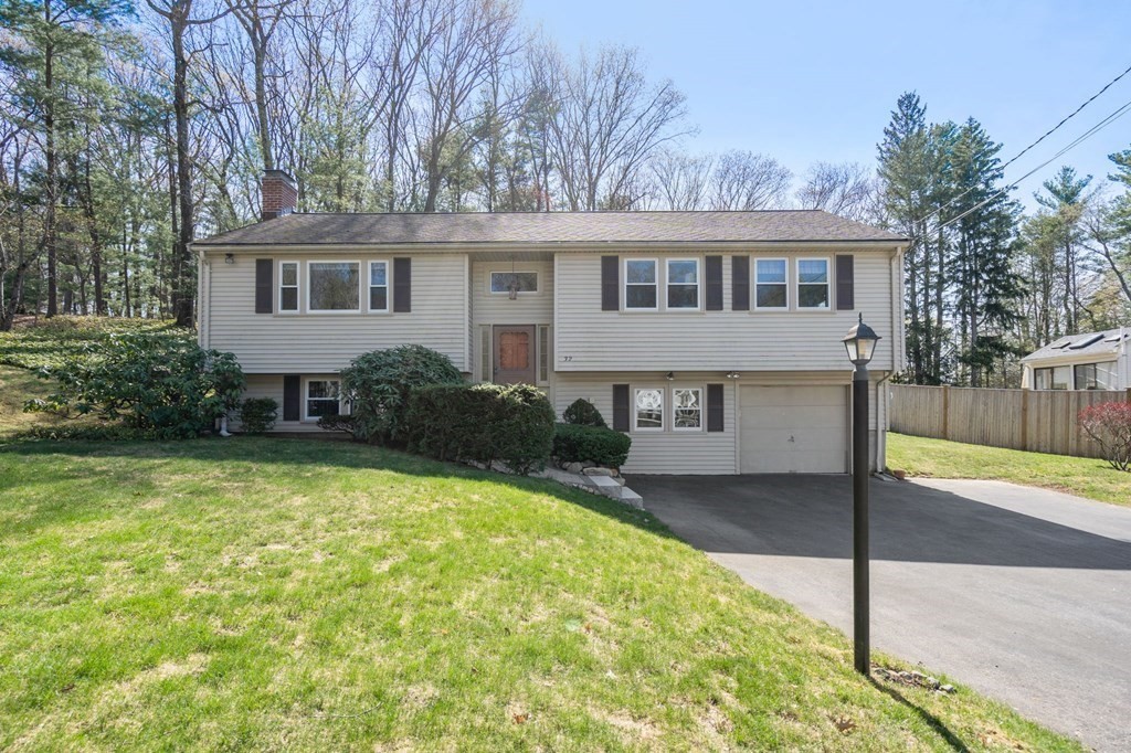 32 Eaton Road Framingham, MA 01701 - Photo 1 of 30 a front view of a house with garden