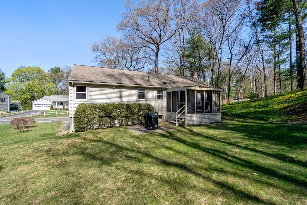 32 Eaton Road Framingham, MA 01701 - Photo 29 of 30 a view of a house with backyard sitting area and garden