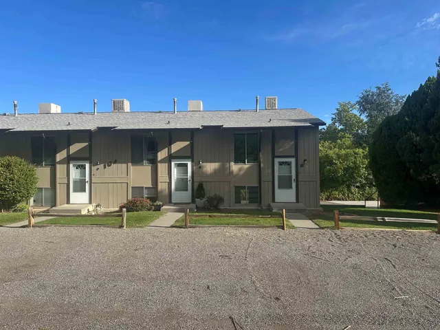 a view of a house with a big yard