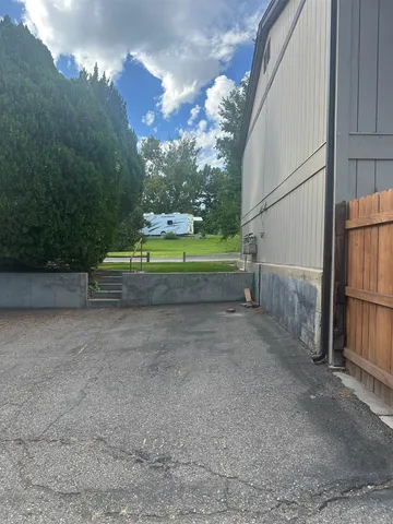 a view of backyard with outdoor and entertaining space