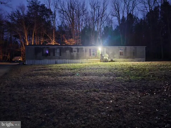 a view of backyard with green space