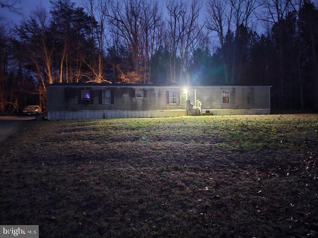a view of backyard with green space