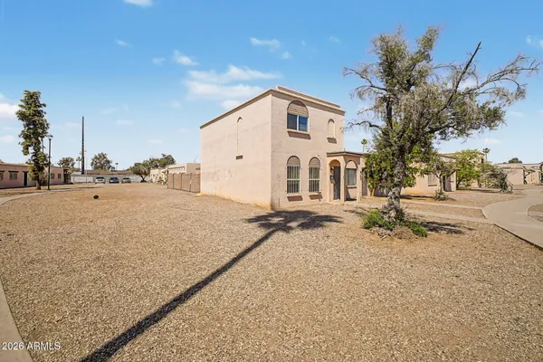 a view of a house with a snow on the road
