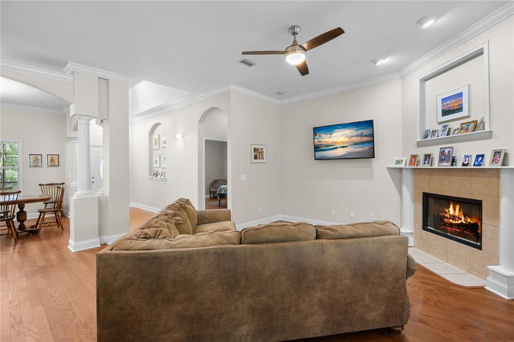 21737 Old Providence Road Alachua, FL 32615 - Photo 11 of 29 a living room with furniture and a fireplace
