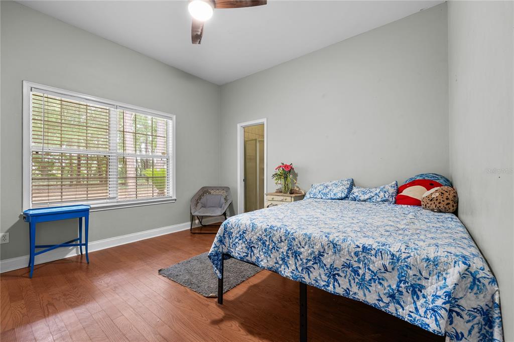 21737 Old Providence Road Alachua, FL 32615 - Photo 22 of 29 a bedroom with a bed and a window