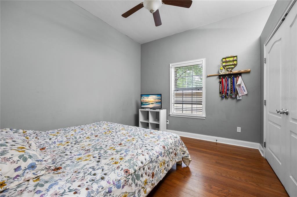 21737 Old Providence Road Alachua, FL 32615 - Photo 24 of 29 a bedroom with a bed and a window