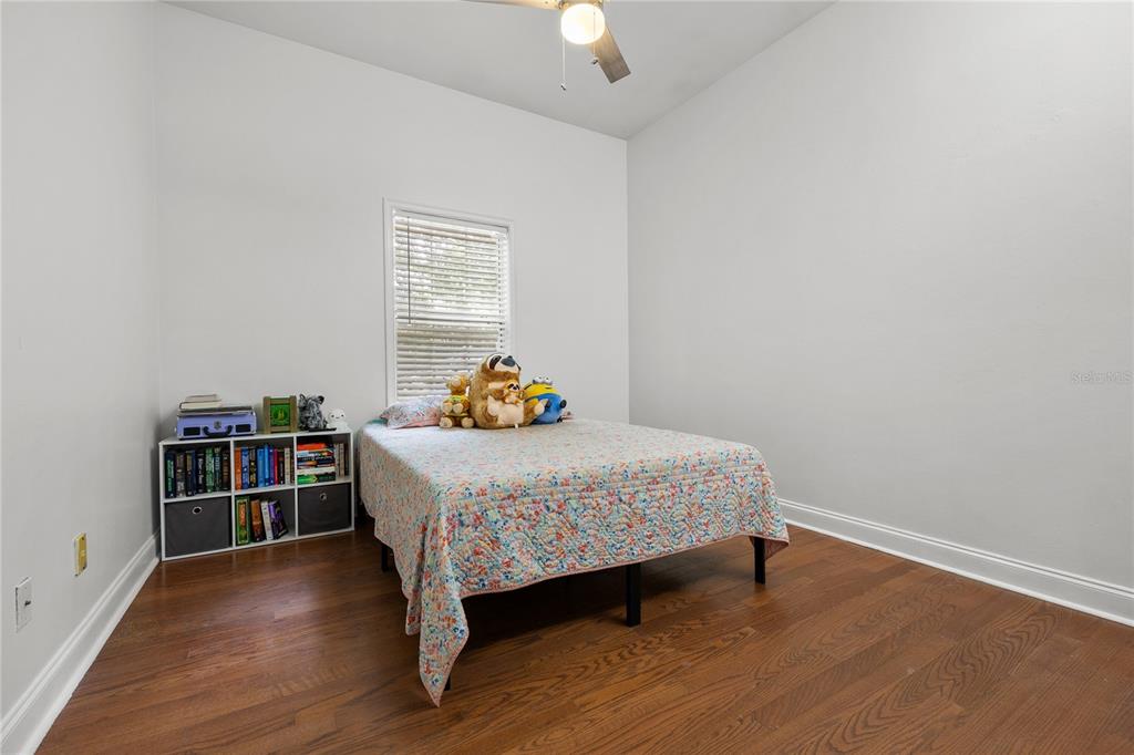 21737 Old Providence Road Alachua, FL 32615 - Photo 28 of 29 a bedroom with a bed and a window