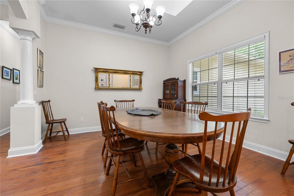 21737 Old Providence Road Alachua, FL 32615 - Photo 8 of 29 a view of a dining room with furniture window and wooden floor