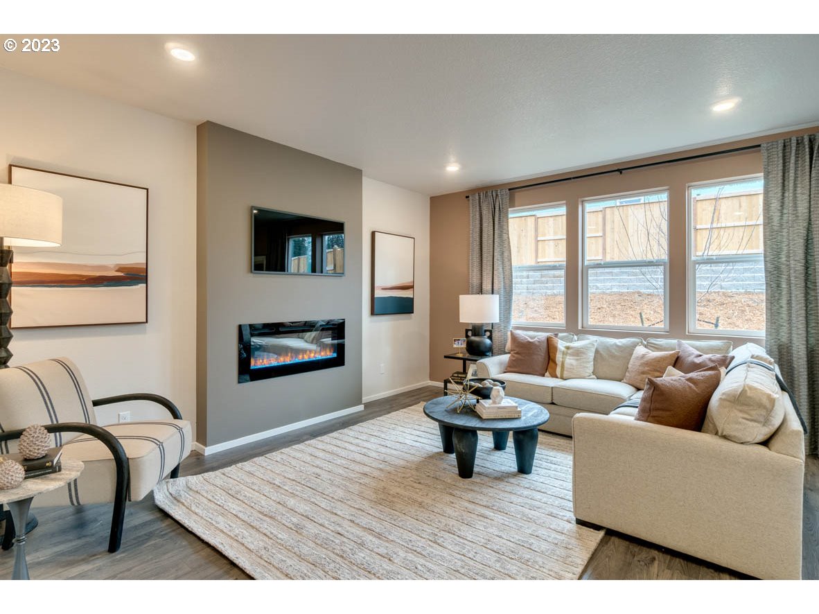 2267 30th Place Springfield, OR 97477 - Photo 3 of 13 a living room with furniture and a flat screen tv