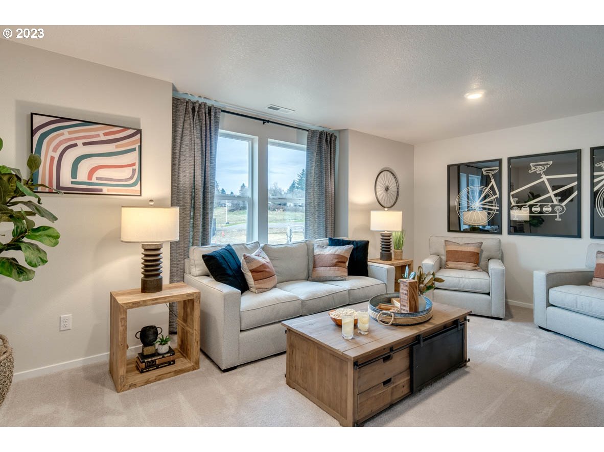 2267 30th Place Springfield, OR 97477 - Photo 6 of 13 a living room with furniture and a large window