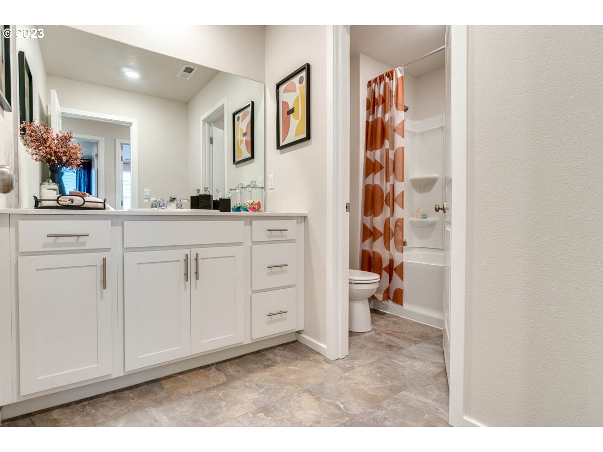 2267 30th Place Springfield, OR 97477 - Photo 9 of 13 a kitchen with white cabinets