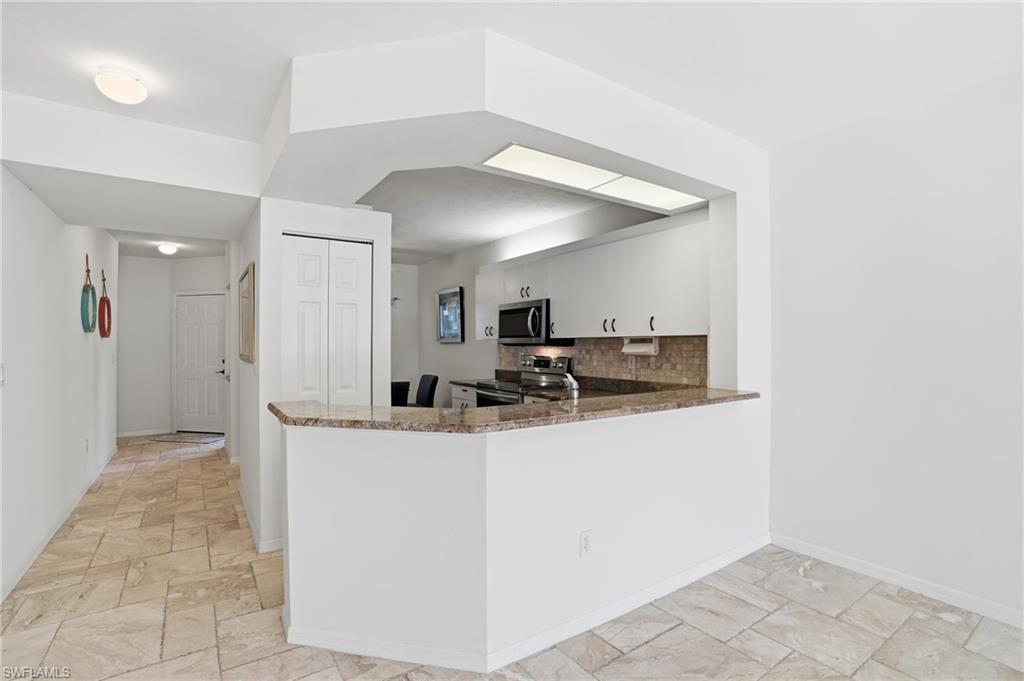2460 Old Groves Road, Unit E102 Naples, FL 34109 - Photo 4 of 25