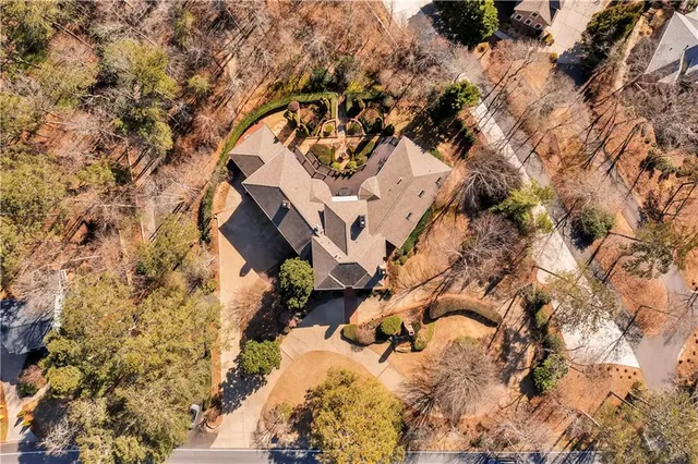 a aerial view of residential house with parking space
