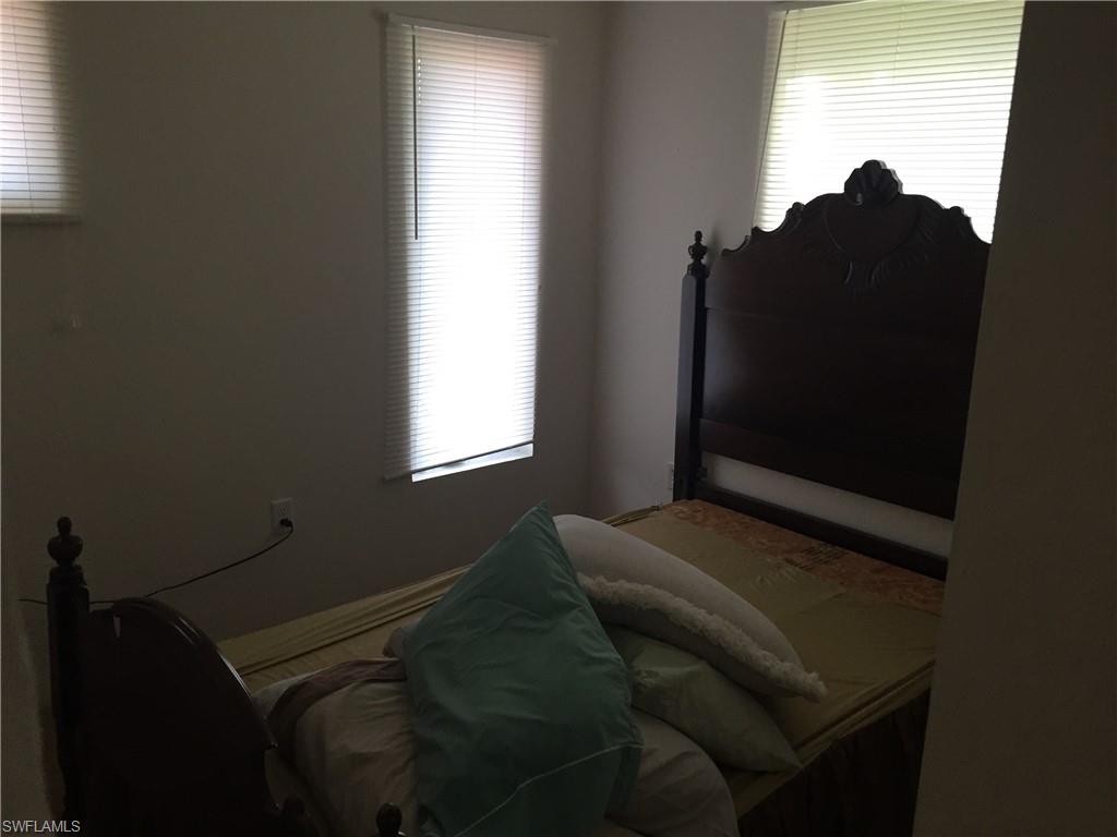 2781 Cecil Road Naples, FL 34114 - Photo 11 of 18 1 of 4 upstairs bedrooms