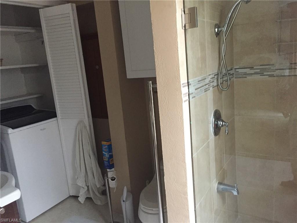 2781 Cecil Road Naples, FL 34114 - Photo 15 of 18 Master Ground floor bath with shower and laundry