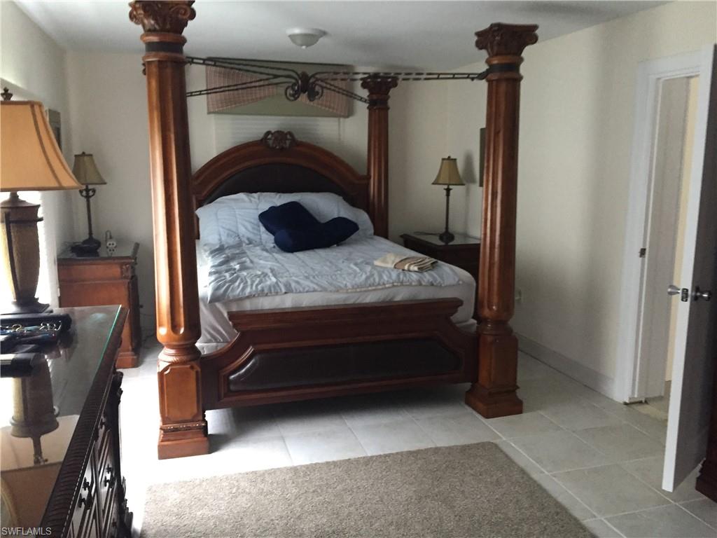 2781 Cecil Road Naples, FL 34114 - Photo 16 of 18 Spacious master bedroom