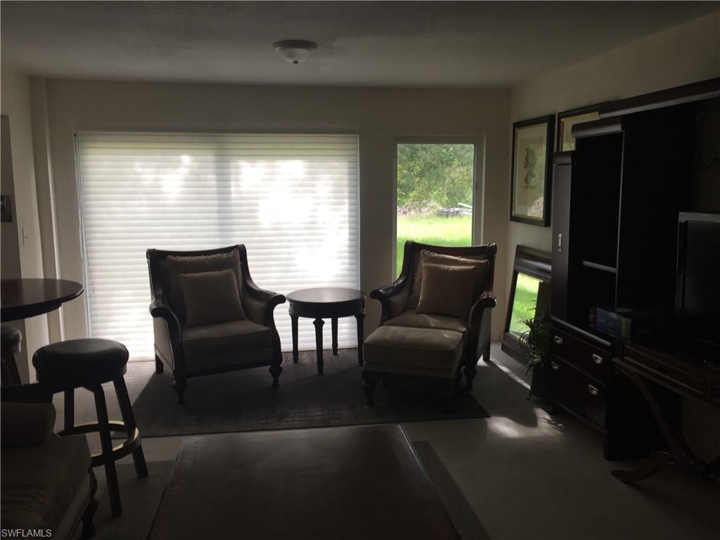 2781 Cecil Road Naples, FL 34114 - Photo 17 of 18 Living room on ground floor 14 x 30