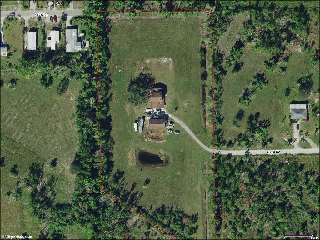 2781 Cecil Road Naples, FL 34114 - Photo 18 of 18 Aerial showing cleared 5 acres with house, garage, entry drive to Greenway Rd