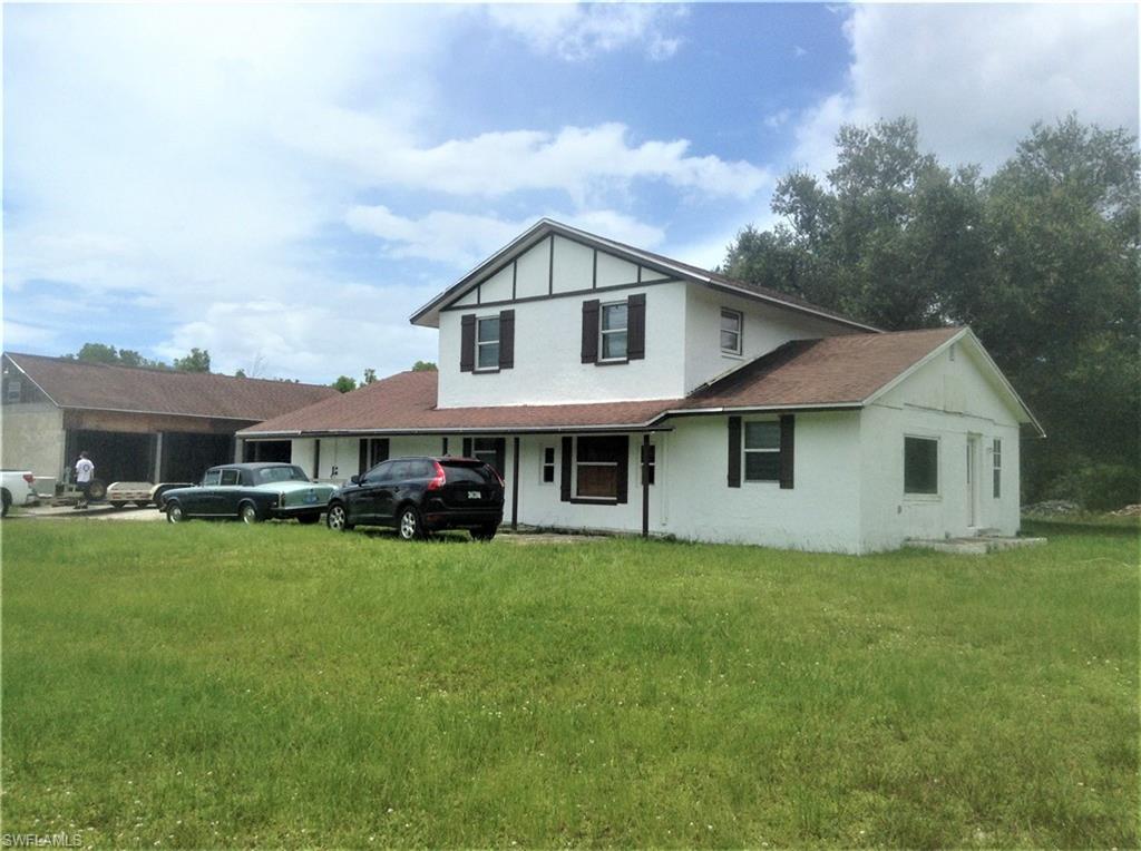 2781 Cecil Road Naples, FL 34114 - Photo 2 of 18 Front yard view of home