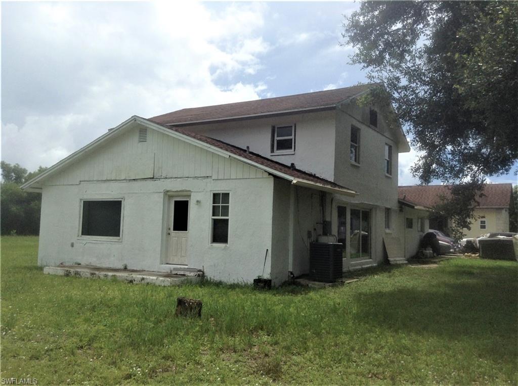 2781 Cecil Road Naples, FL 34114 - Photo 4 of 18 Side & rear view of home