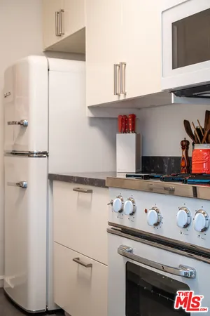 a kitchen with a stove and a microwave