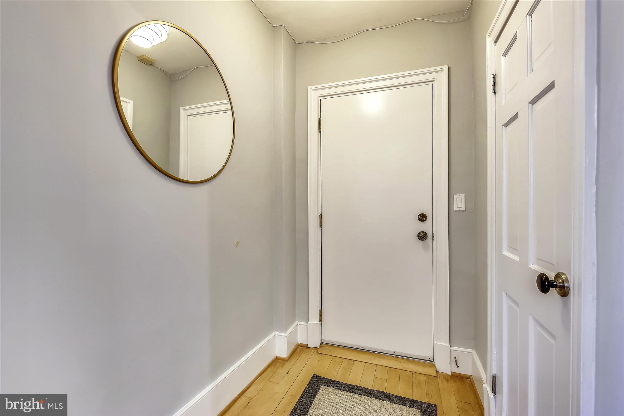 2801 Adams Mill Road Northwest, Unit 101 Washington, DC 20009 - Photo 4 of 28 Foyer with huge coat closet