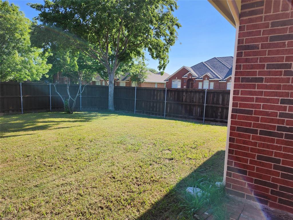 1329 Kingsley Court Allen, TX 75013 - Photo 13 of 13 a view of a backyard