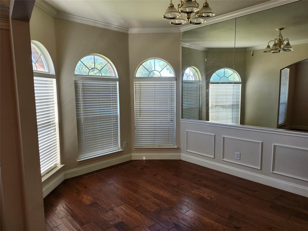 1329 Kingsley Court Allen, TX 75013 - Photo 3 of 13 a view of a entryway door with wooden floor
