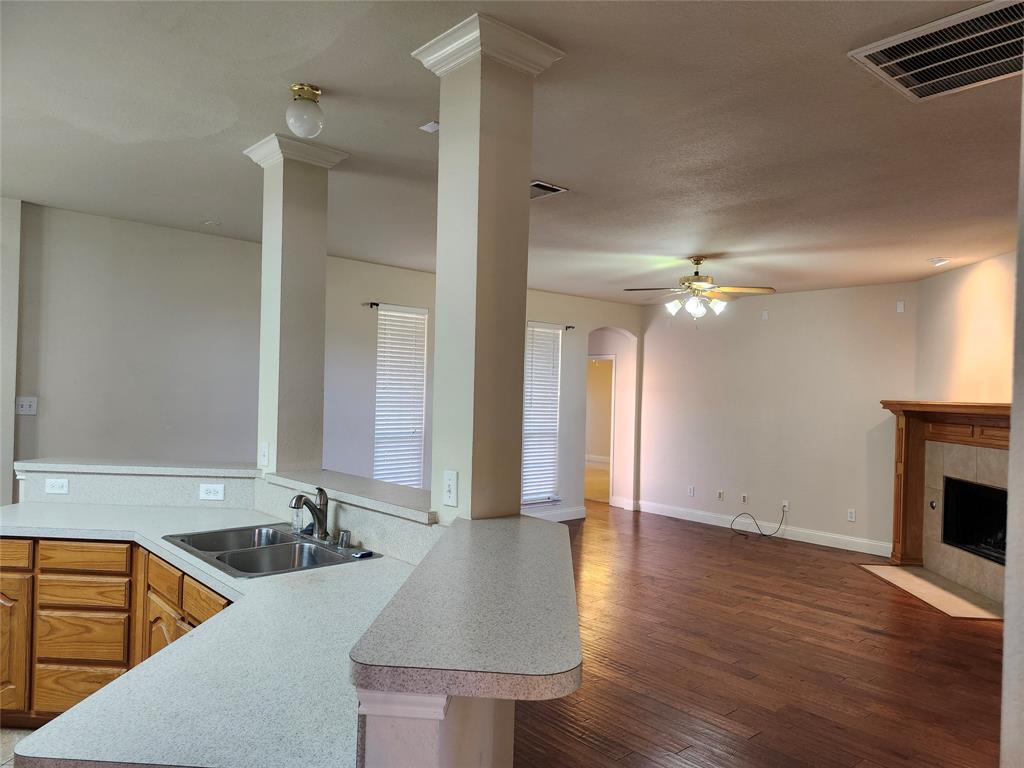 1329 Kingsley Court Allen, TX 75013 - Photo 5 of 13 a bathroom with a sink double vanity granite and a shower