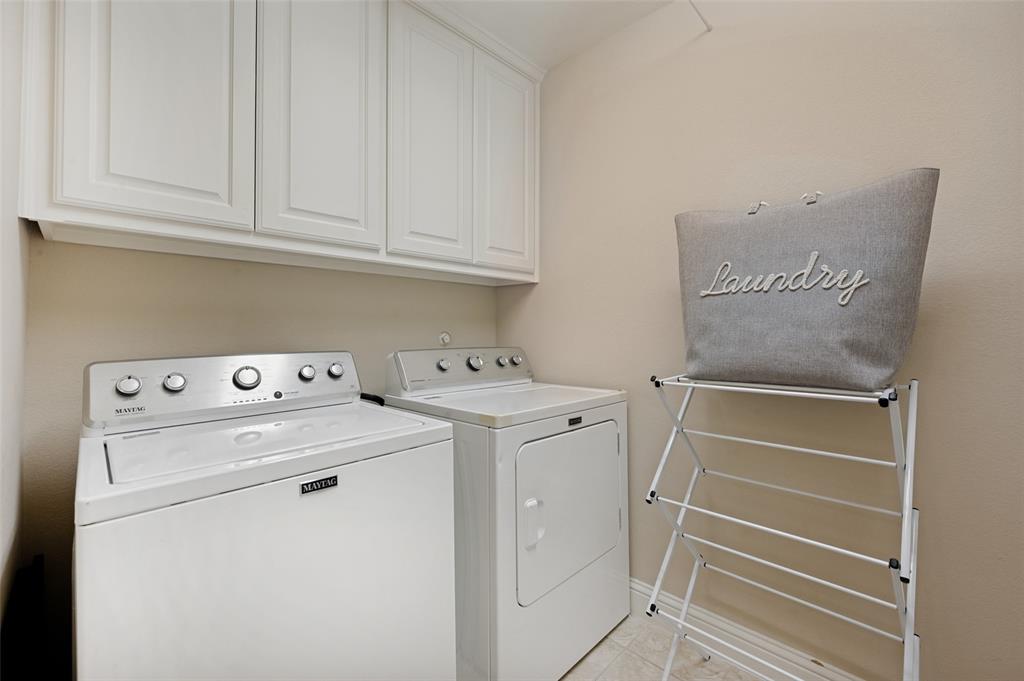 773 South Coppell Road Coppell, TX 75019 - Photo 25 of 30 a utility room with dryer and washer