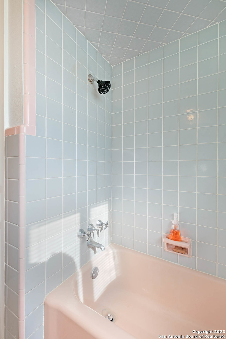 463 Cherry Ridge San Antonio, TX 78213 - Photo 15 of 19 a bathroom with a sink and a shower