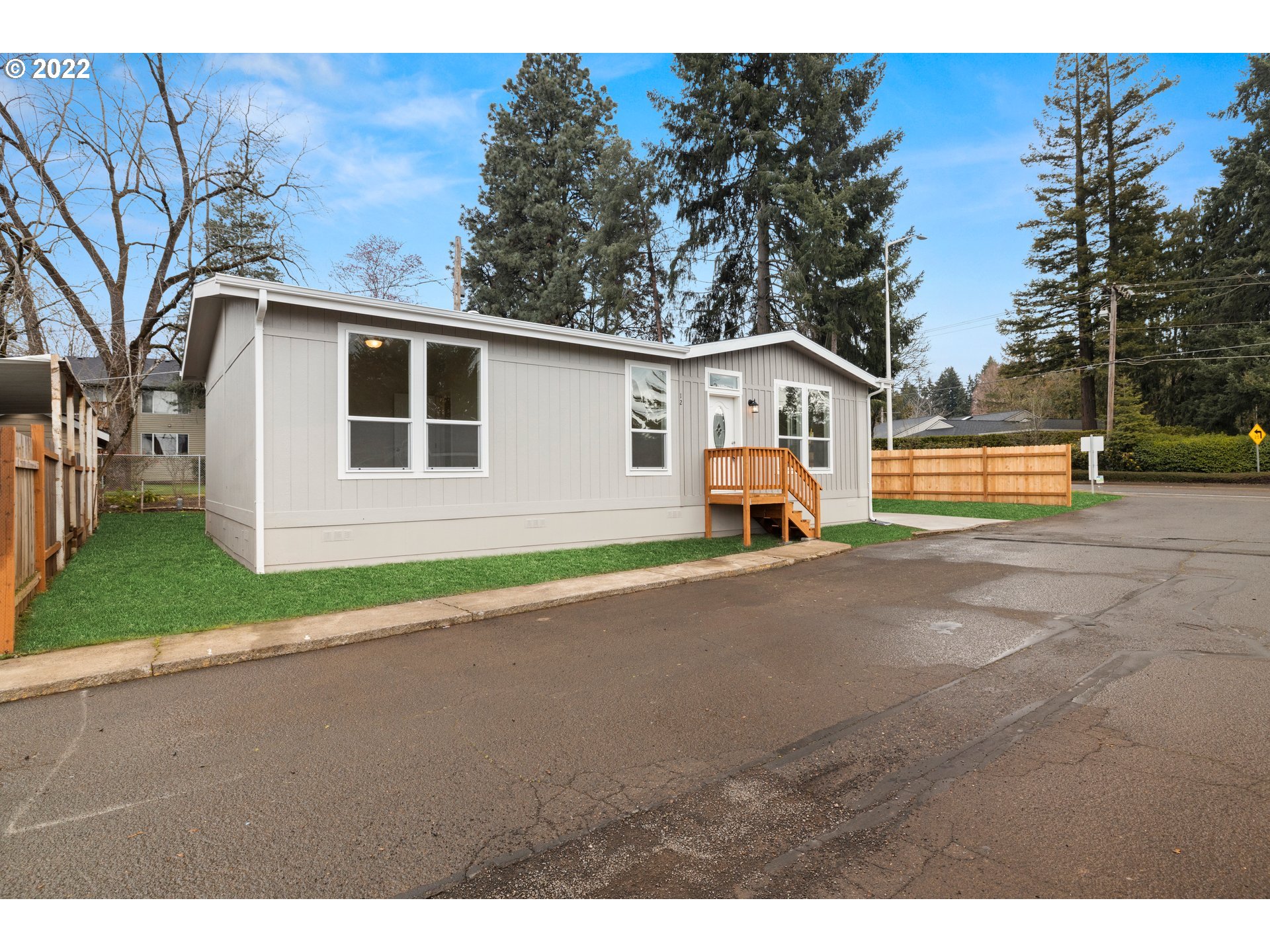 a house view with a backyard space