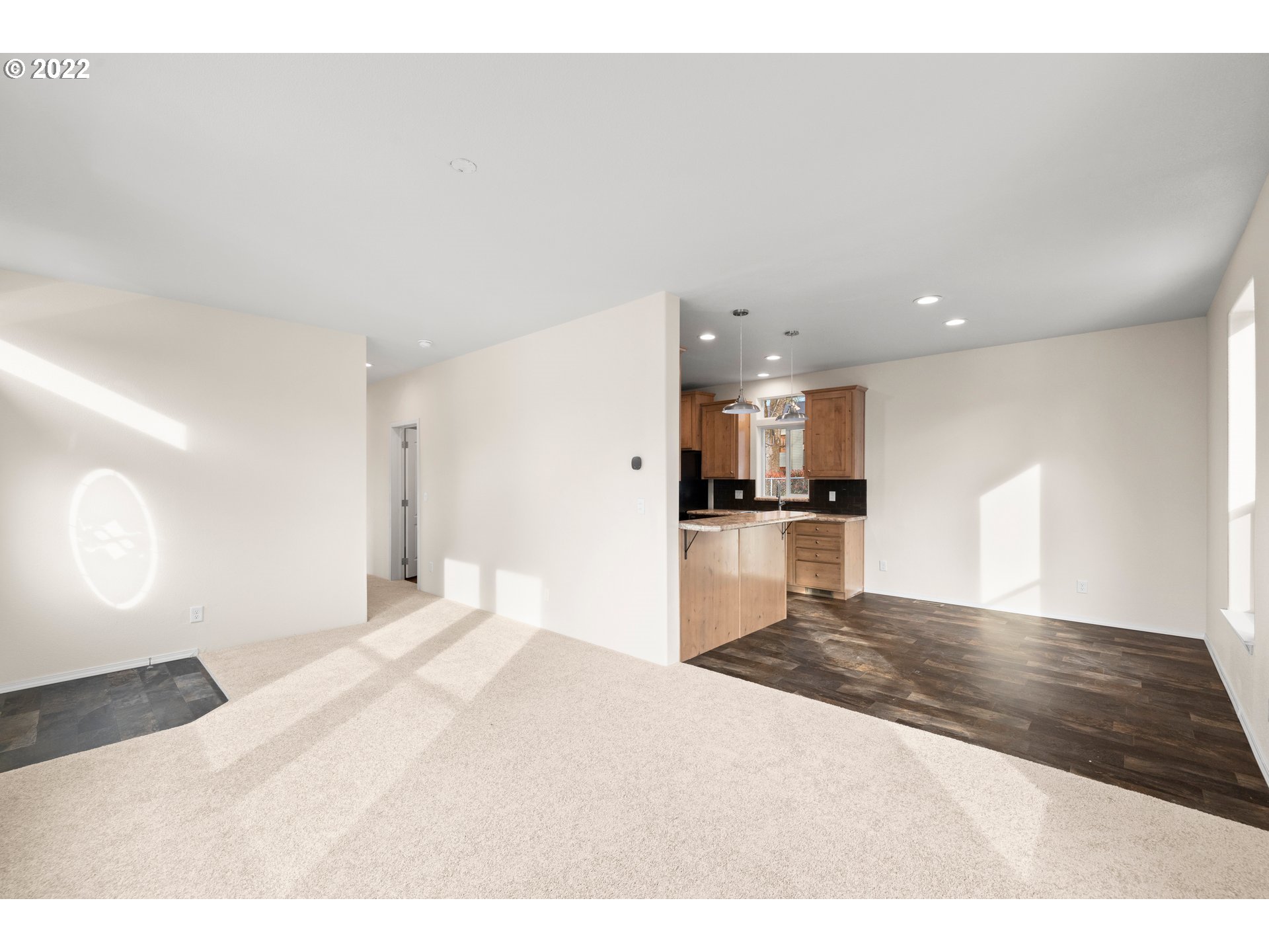 9700 Southwest Tualatin Road, Unit 12 Tualatin, OR 97062 - Photo 17 of 30 a view of kitchen with refrigerator sink and cabinets
