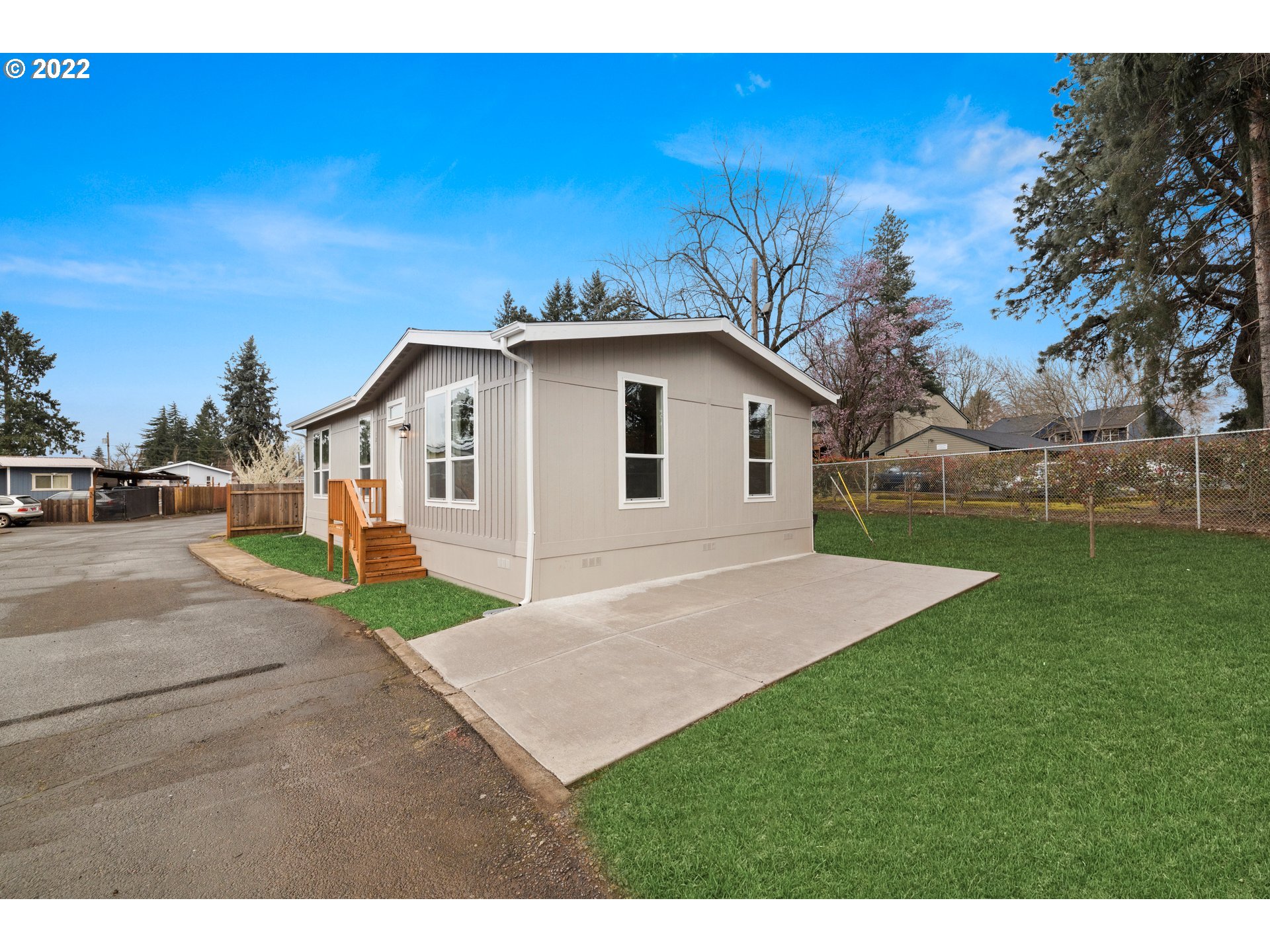 9700 Southwest Tualatin Road, Unit 12 Tualatin, OR 97062 - Photo 2 of 30 a view of backyard of house with green space