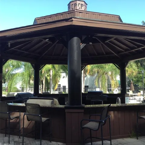 a view of a two chairs in the roof deck