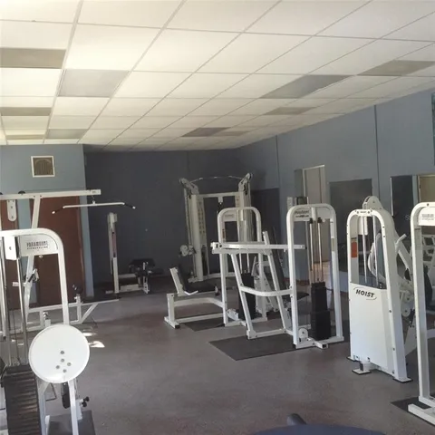 a view of a room with gym equipment