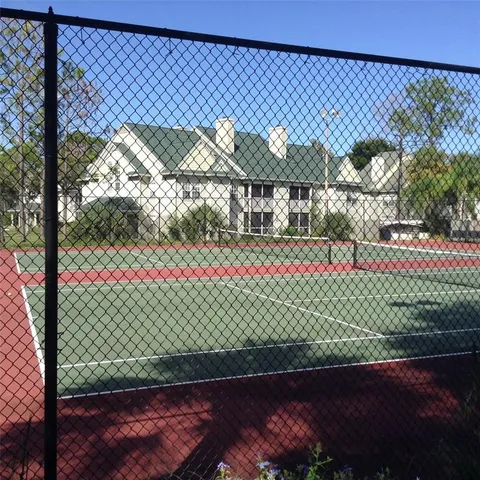 a view of swimming pool with a yard