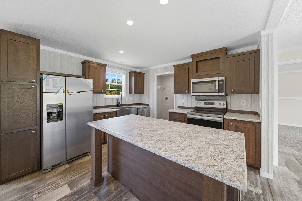 42 Divine Drive Murphy, NC 28906 - Photo 6 of 10 a kitchen with stainless steel appliances granite countertop a refrigerator oven a sink and dishwasher