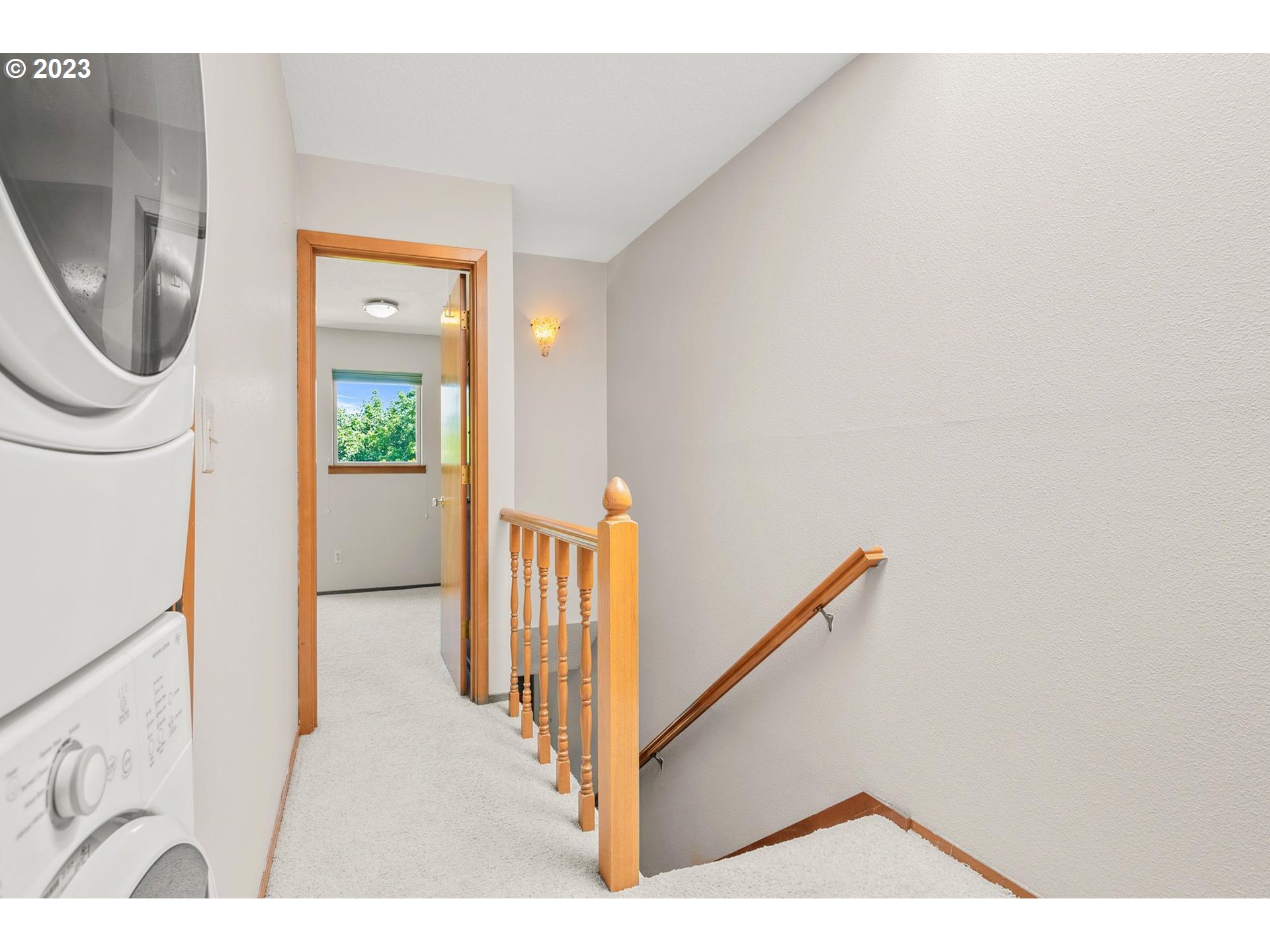 2785 Northwest Upshur Street, Unit B Portland, OR 97210 - Photo 15 of 35 a view of a hallway with painted walls