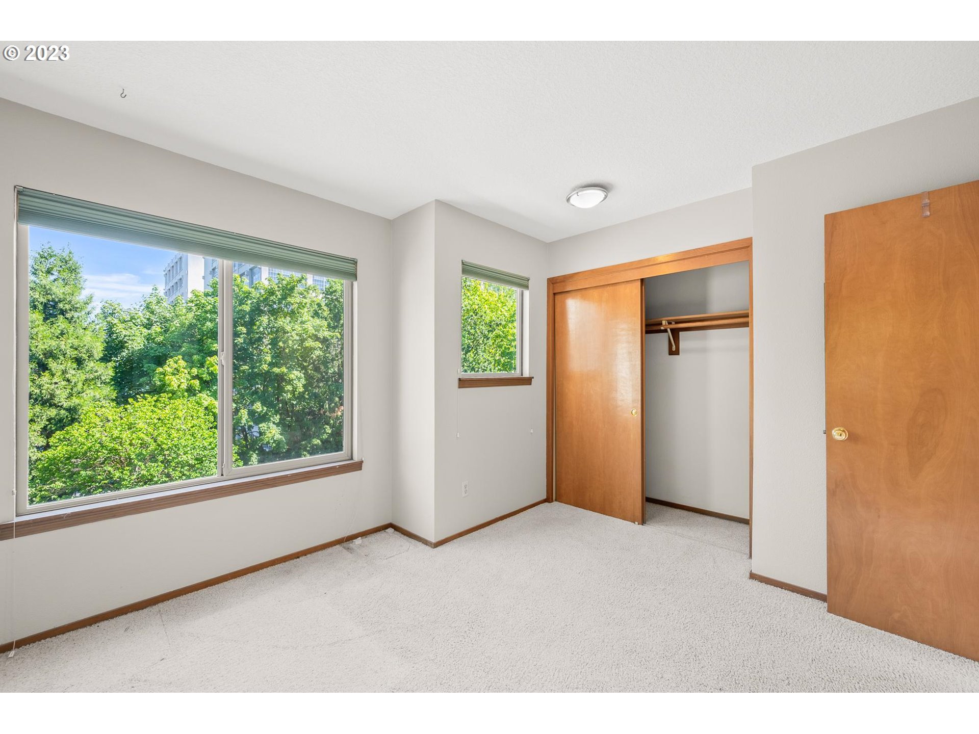 2785 Northwest Upshur Street, Unit B Portland, OR 97210 - Photo 16 of 35 a view of an empty room with a window