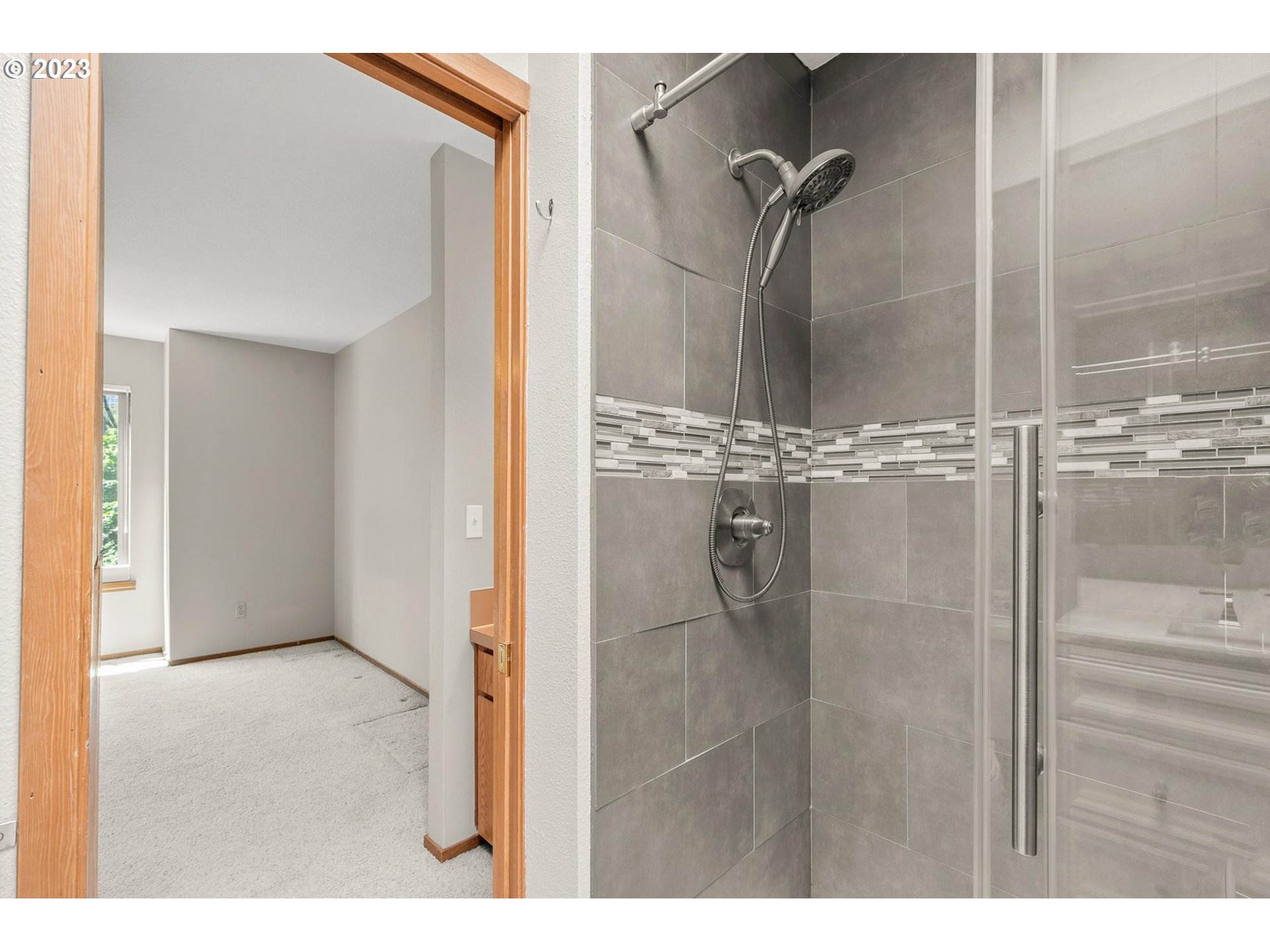 2785 Northwest Upshur Street, Unit B Portland, OR 97210 - Photo 24 of 35 a bathroom with a shower