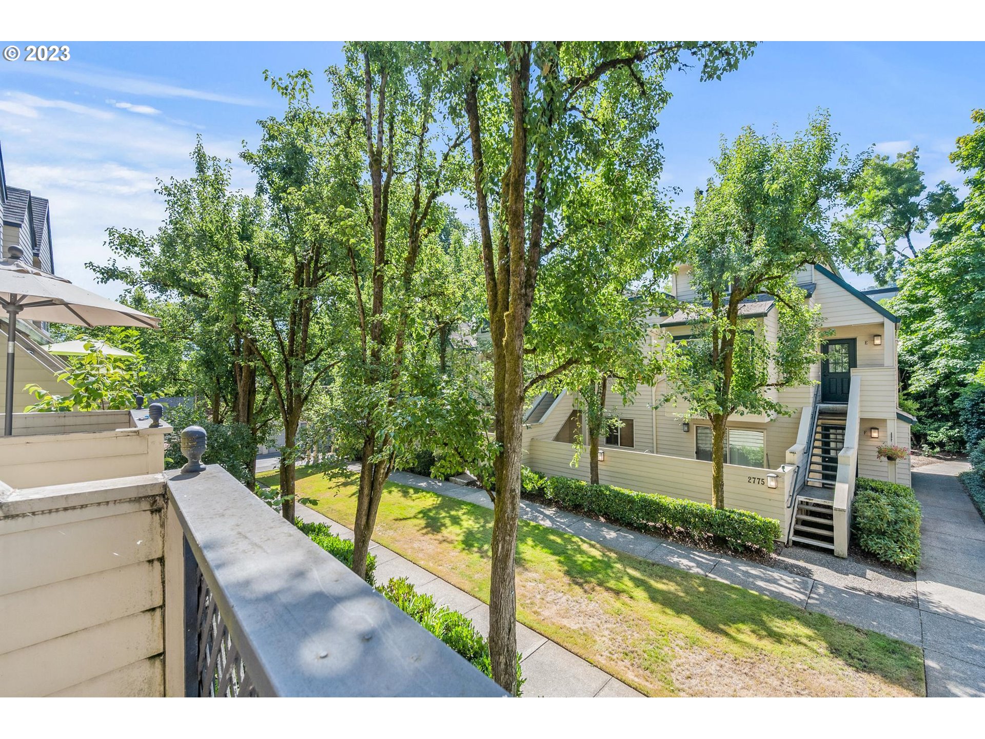 2785 Northwest Upshur Street, Unit B Portland, OR 97210 - Photo 26 of 35 a view of a backyard with sitting area