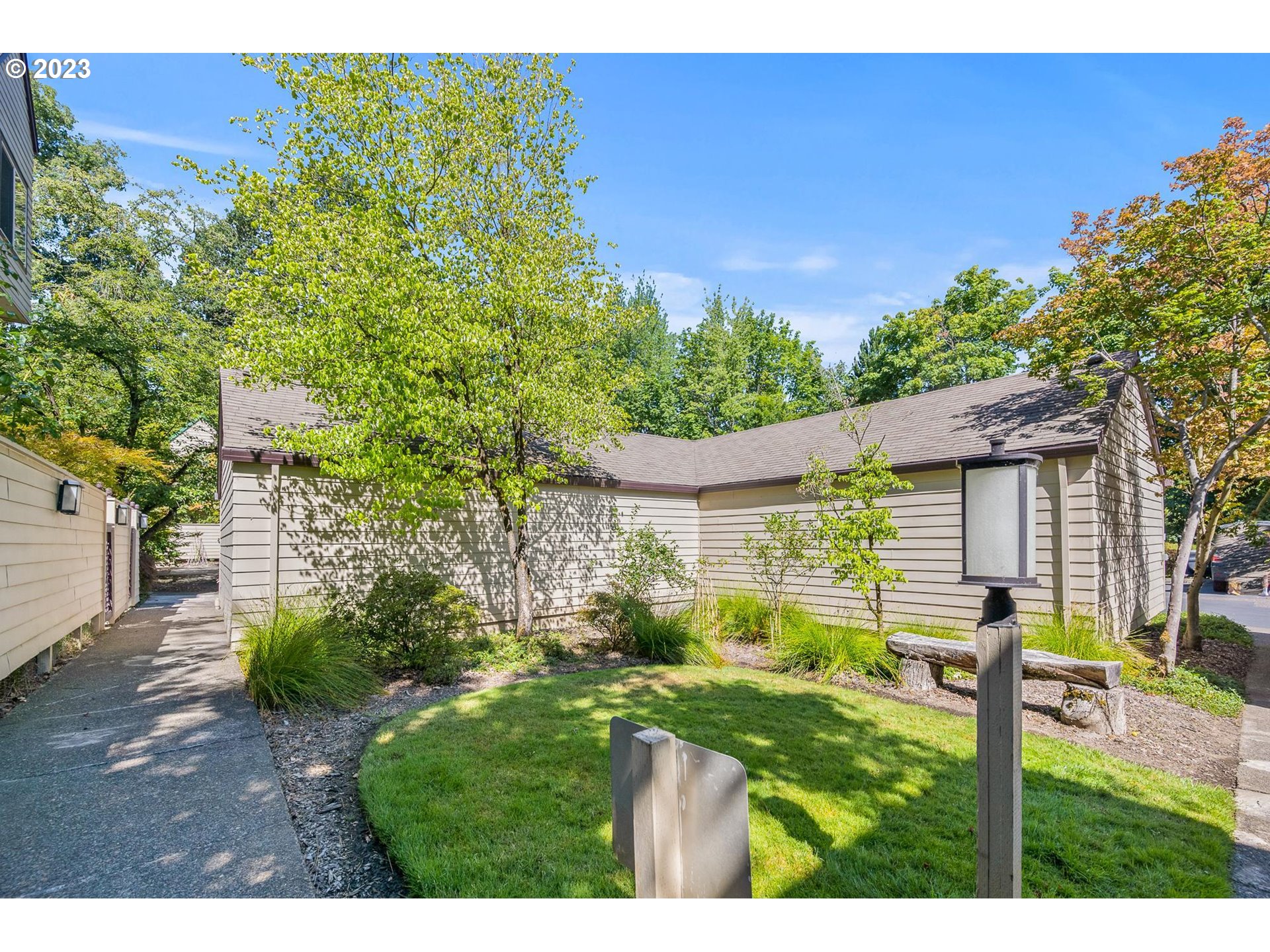 2785 Northwest Upshur Street, Unit B Portland, OR 97210 - Photo 27 of 35 a view of a house with a yard