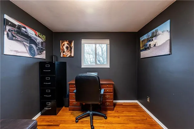 a workspace with furniture and window
