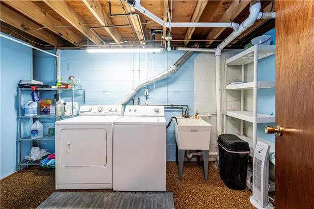 a utility room with dryer and washer